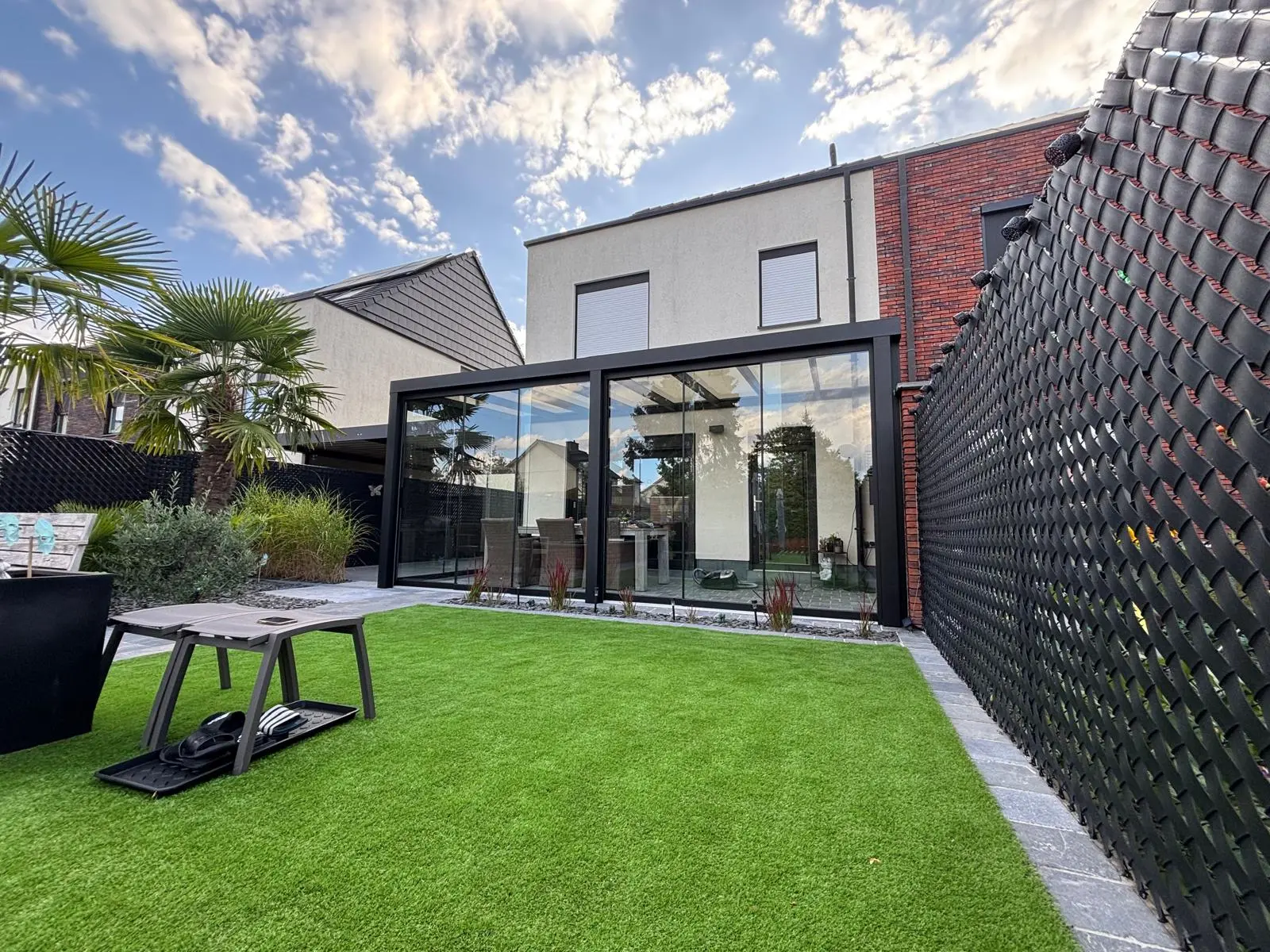 Terrasoverkapping met glazen schuifwanden