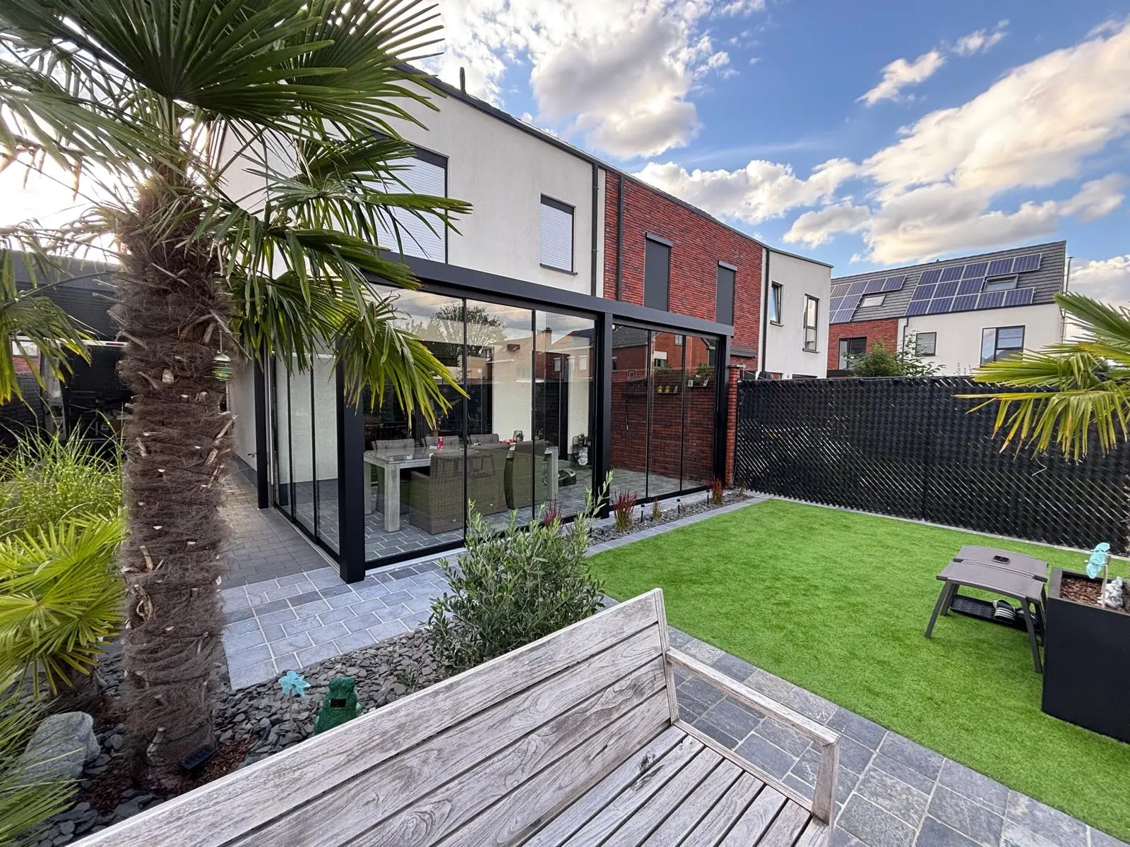 Terrasoverkapping met glazen schuifwanden