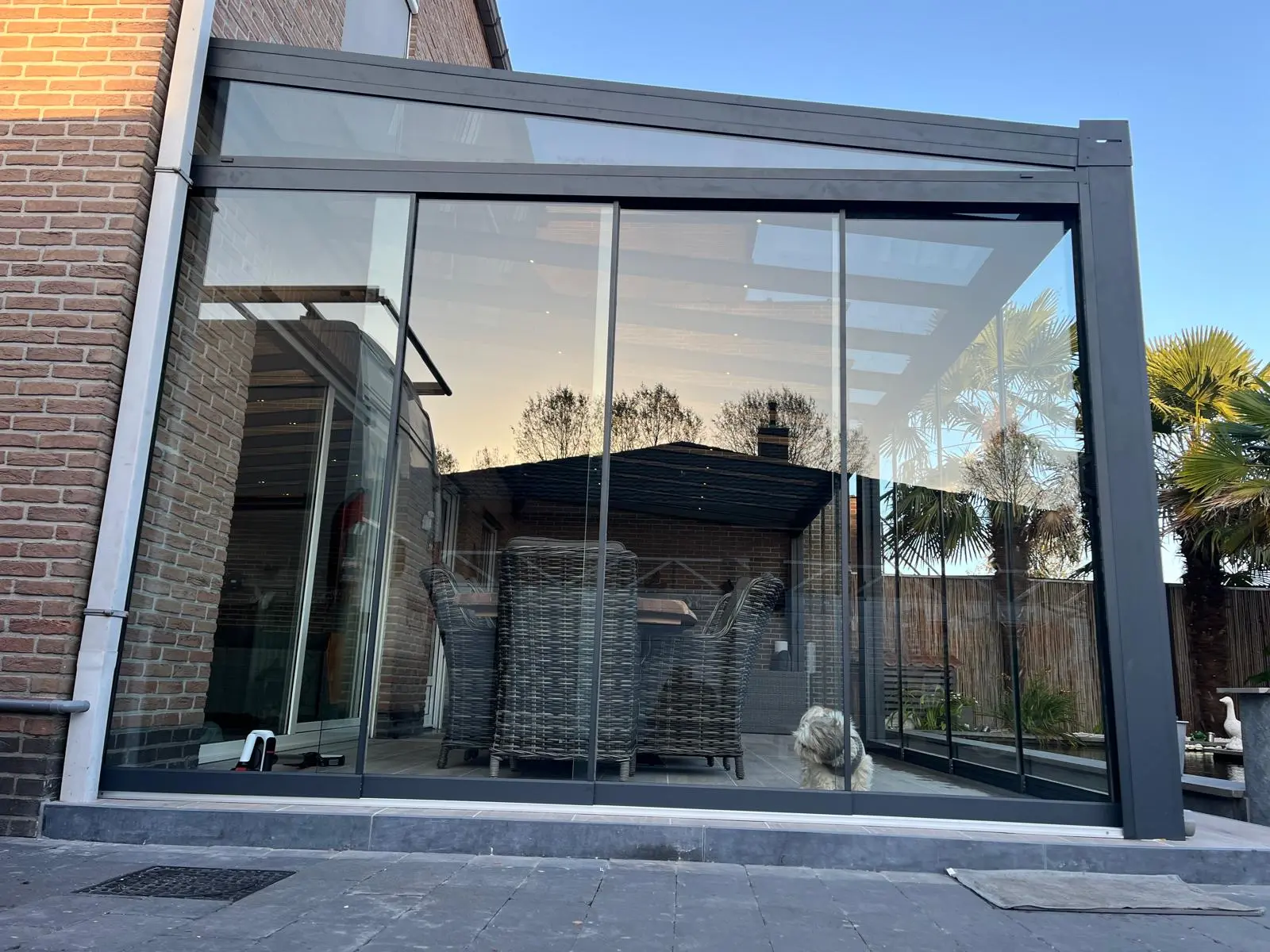 Terrasoverkapping met glazen schuifwanden