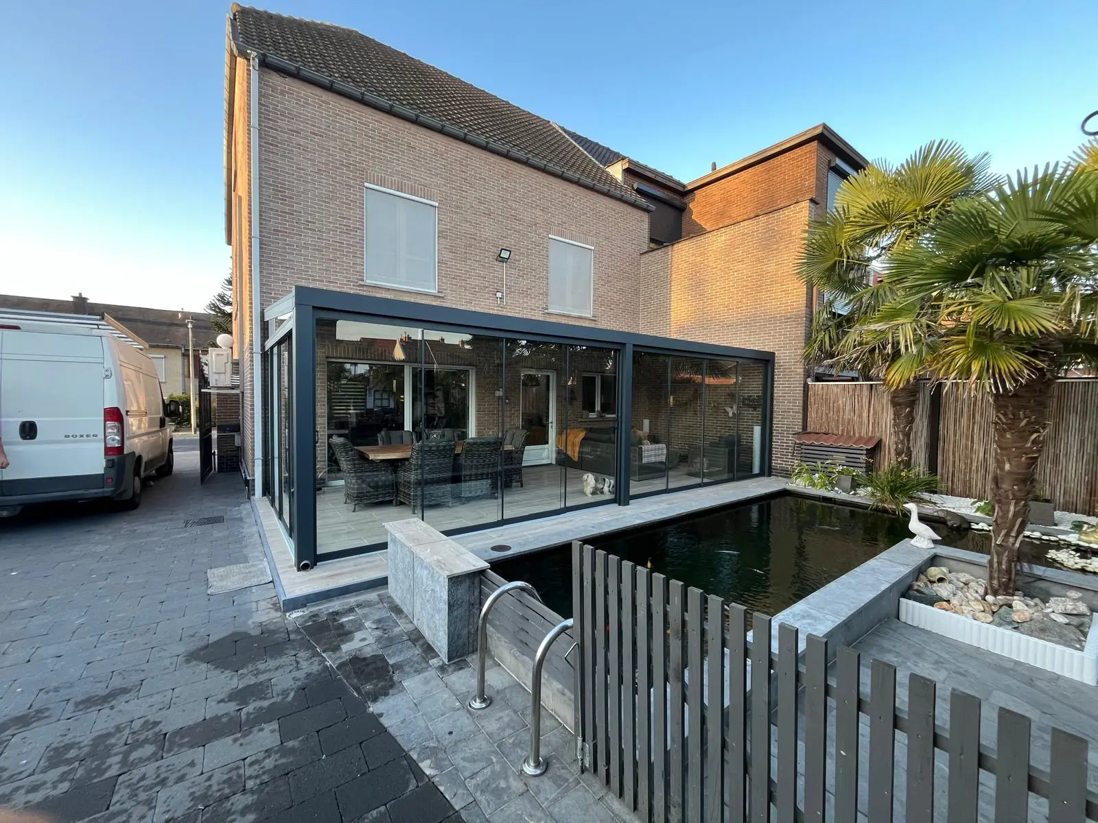 Terrasoverkapping met glazen schuifwanden